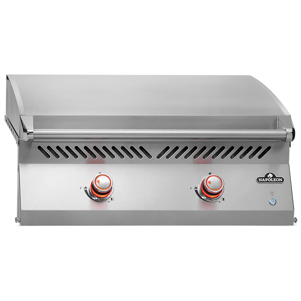 Built-in flat top griddle with stainless front panel, control knobs, and vented heat shield