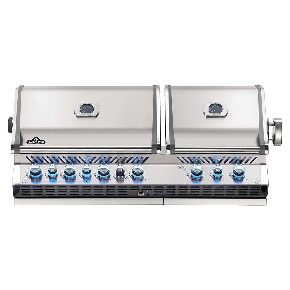 Stainless steel built-in gas grill with blue-lit burner knobs and front controls