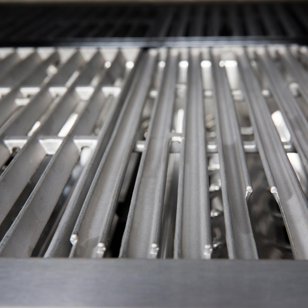 Close-up of stainless steel cooking grid bars with cross supports