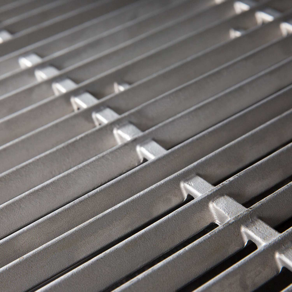 Close-up of stainless steel cooking grid bars and notch cutouts