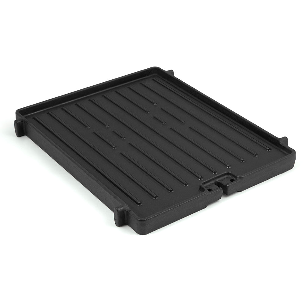 Cast iron side burner griddle with ridged grill surface and side handles