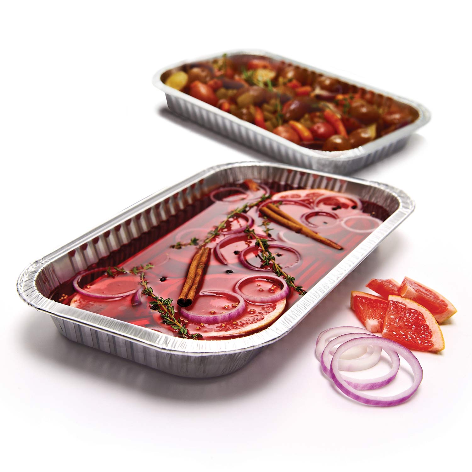 Narrow aluminum drip pan with red food and onion slices, foil tray