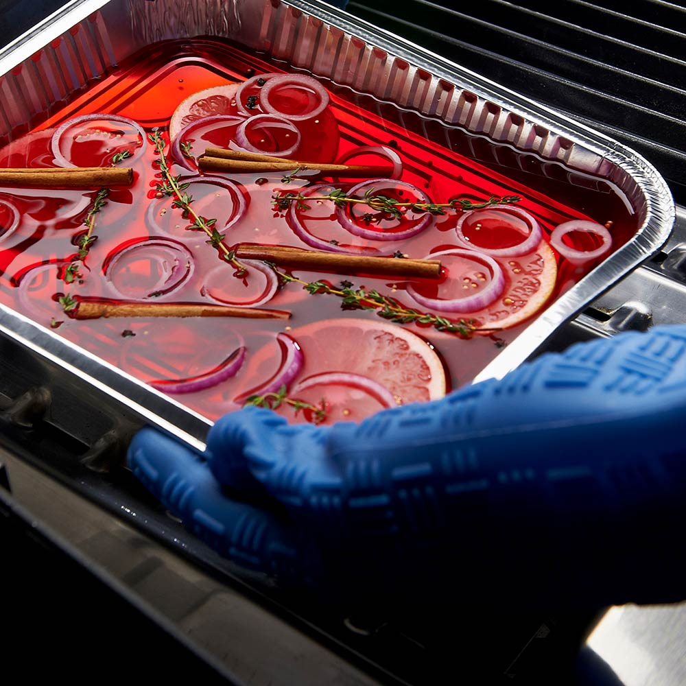 Aluminum drip pan tray with seasoning and juices, inside grill, silver