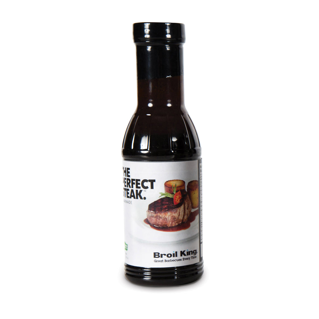 Broil King steak marinade bottle with black cap and brown liquid, front label view