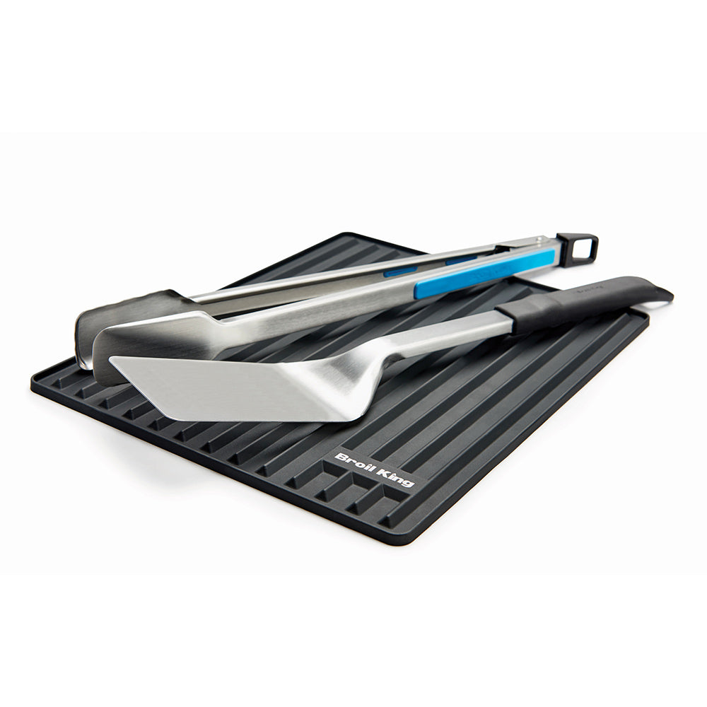 Black silicone side shelf mat with ridged surface and Broil King logo
