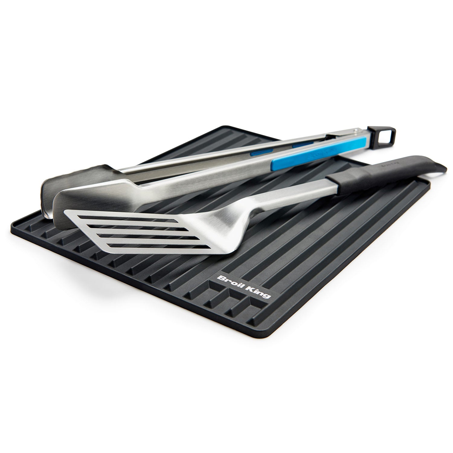 Silicone grill side shelf mat with ridged surface holding grill tools, dark gray