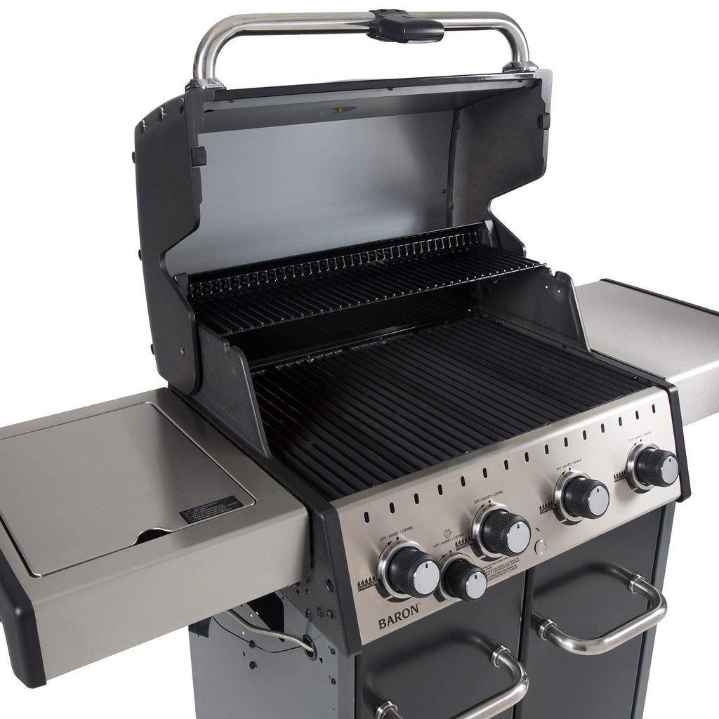 Broil King grill light on open grill lid over cooking grates