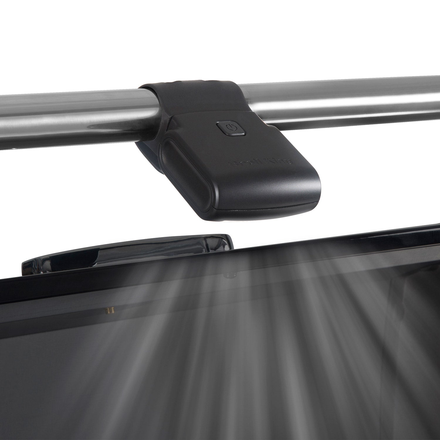 Broil King grill light on grill frame casting a beam downward