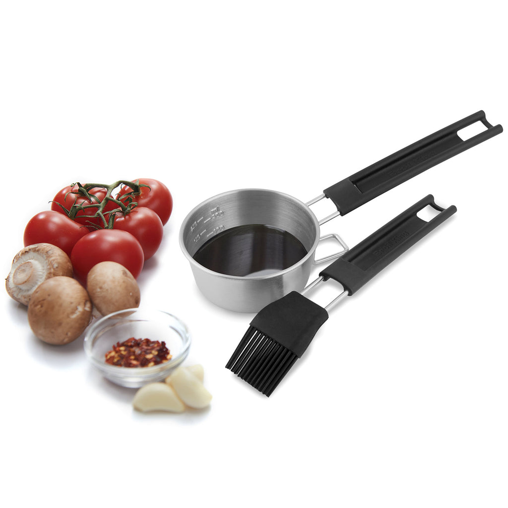 Basting set with stainless pot and two black basting brush heads