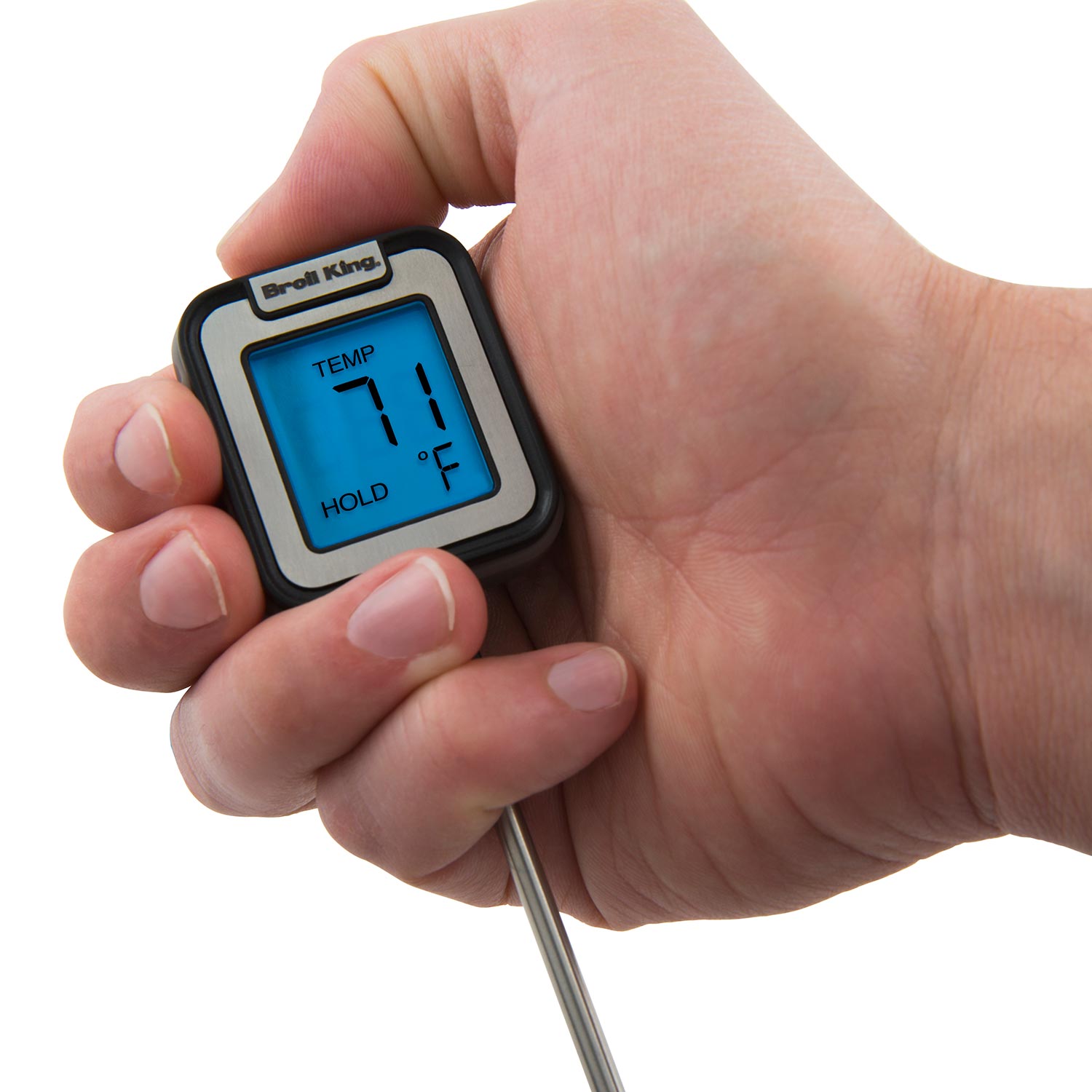 Instant read thermometer held in hand with metal probe, blue digital temperature display