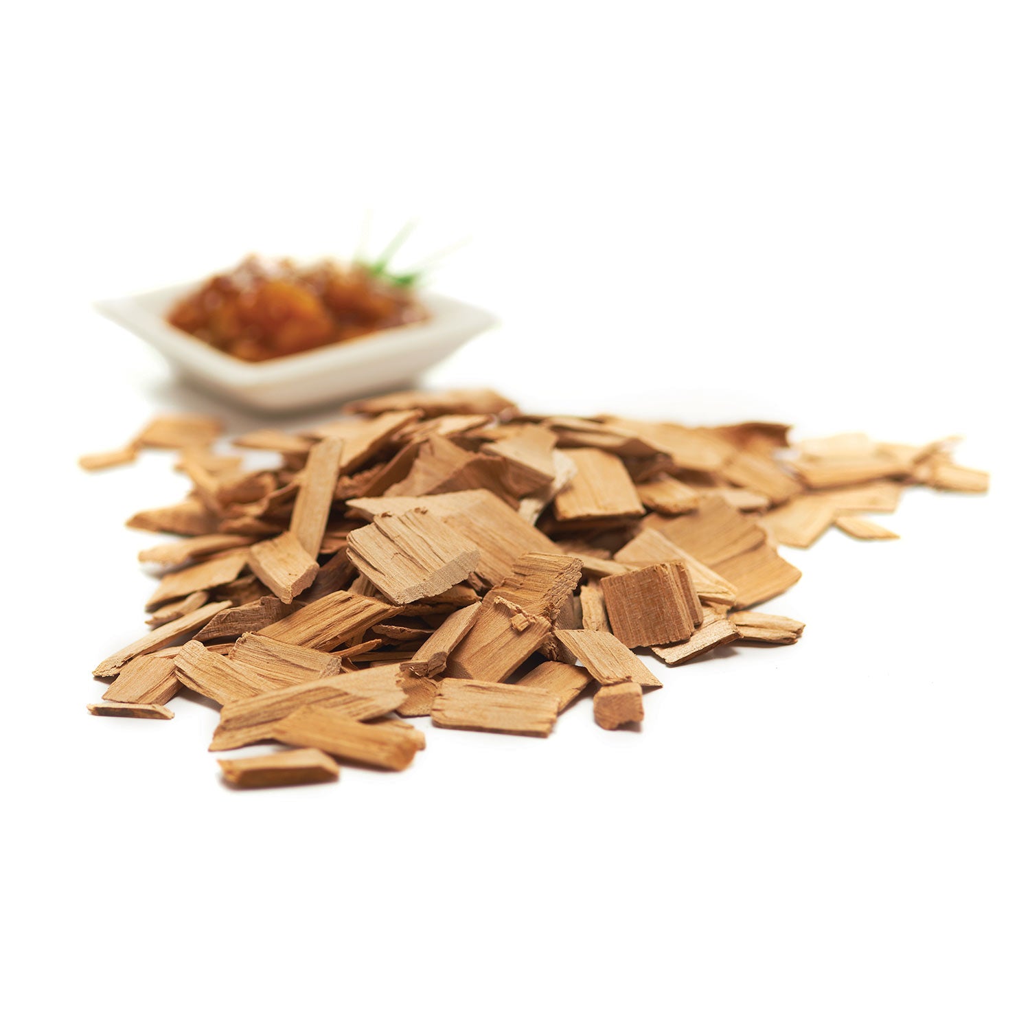 Loose mesquite wood chips, small rectangular bark and wood pieces