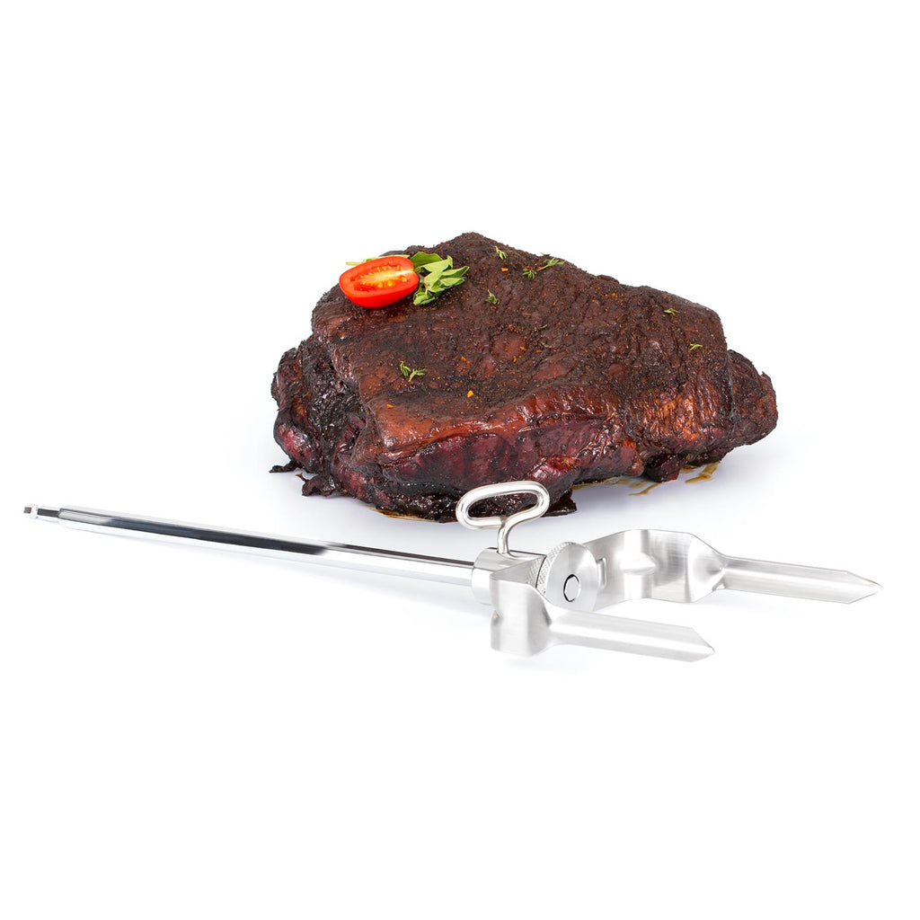 Broil King meat shredder attachment over seasoned brisket with small garnish