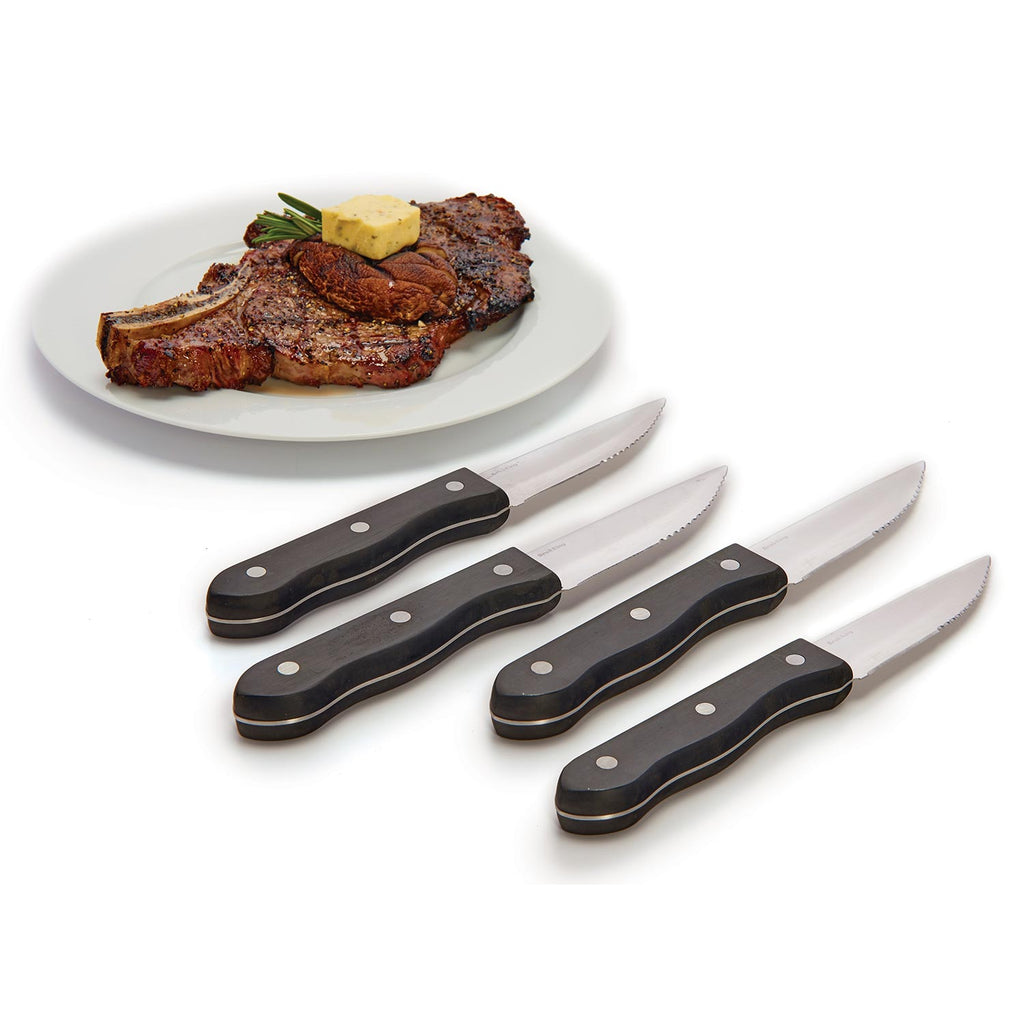 Steak knife set with black handles and silver serrated blades, shown with cooked steak