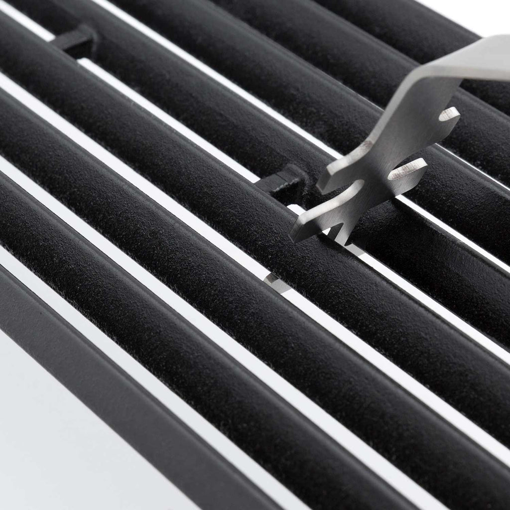 Broil King grid lifter metal prongs engaged between black grill grates