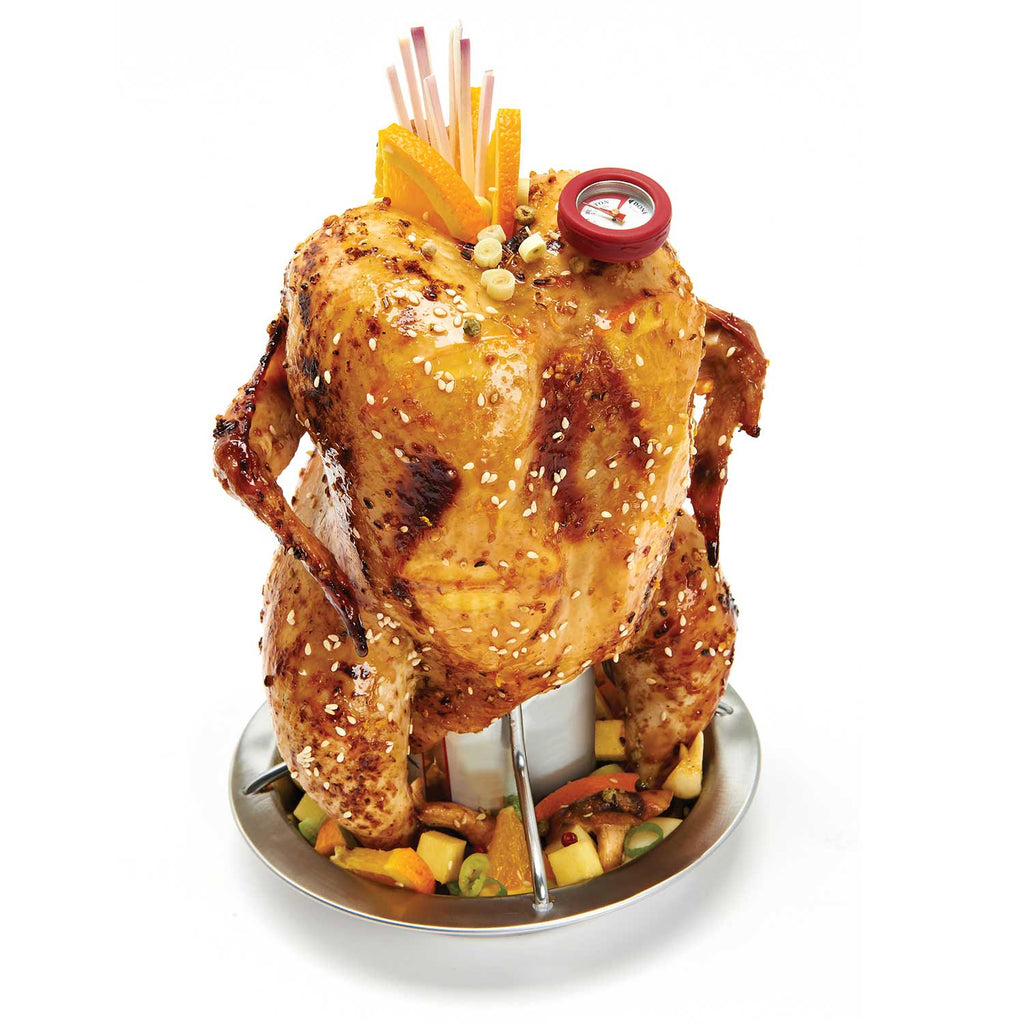 Whole roasted chicken on metal chicken roaster stand with red thermometer