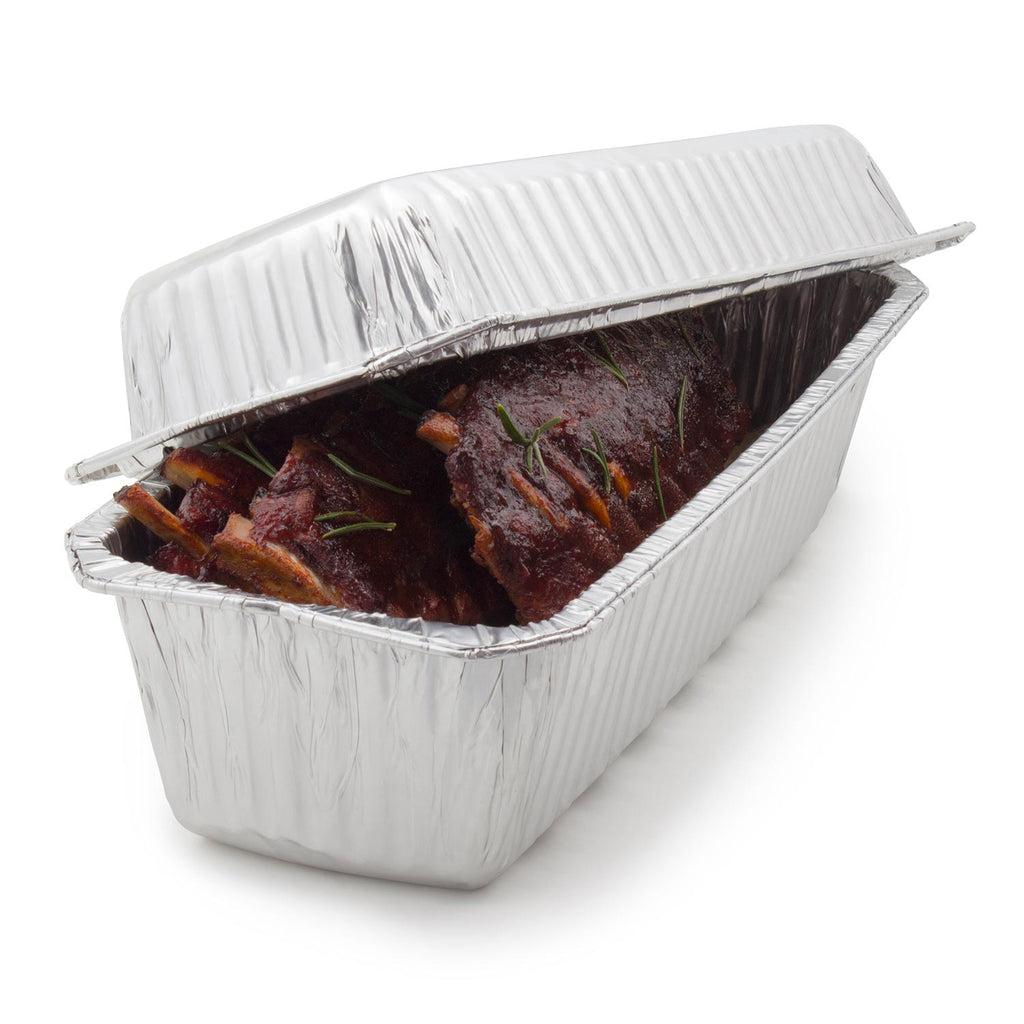 Aluminum foil ribbed roaster liner with handles, holding cooked meat