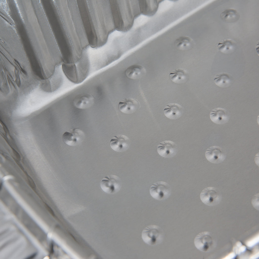 Aluminum foil roaster liner interior with raised dots texture