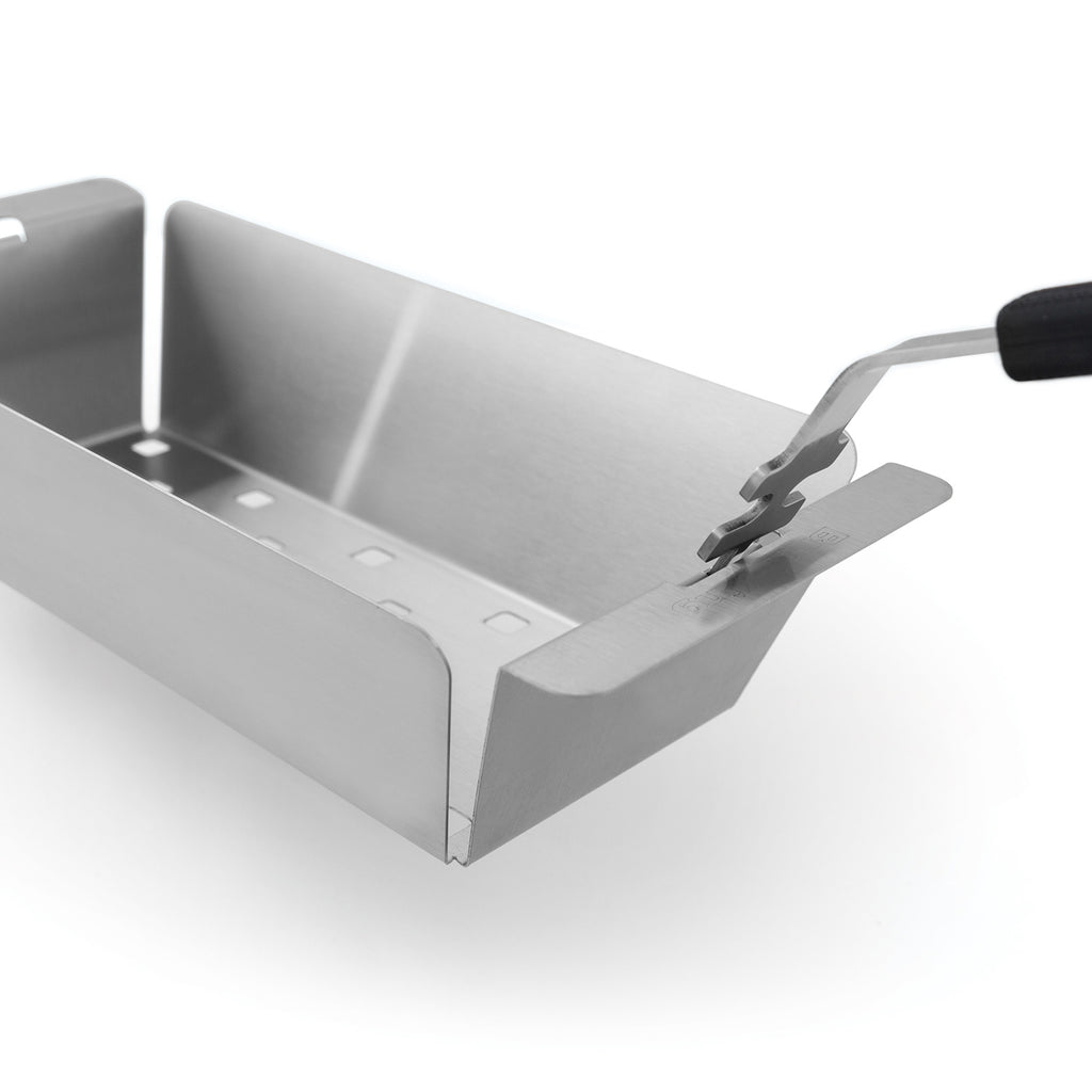 Stainless steel wok grill topper with grate and locking tabs, tool shown