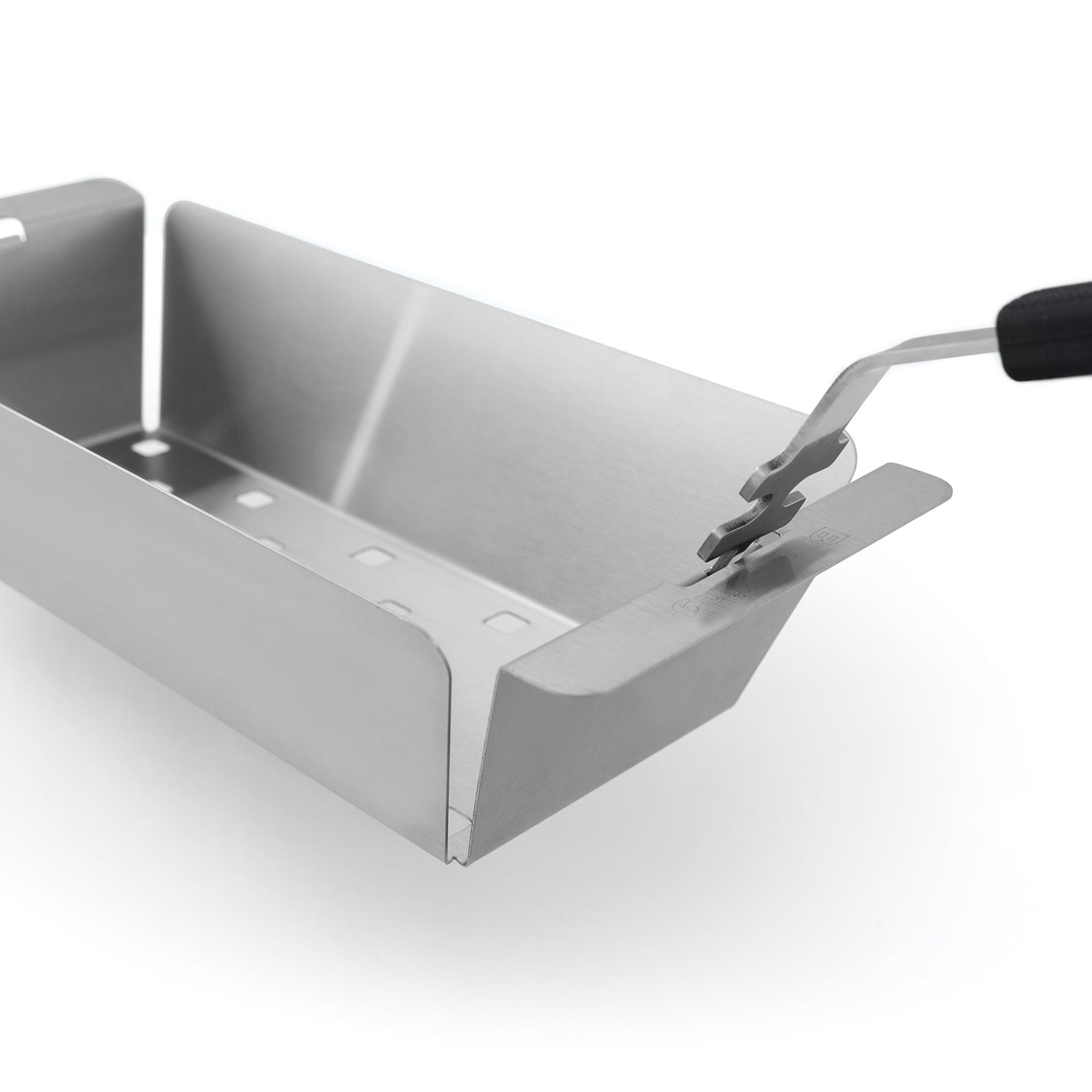 Stainless steel wok grill topper with grate and locking tabs, tool shown