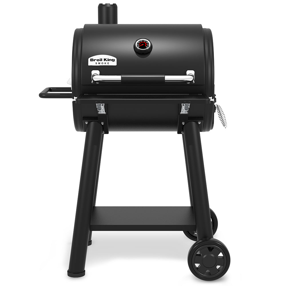 Broil King charcoal smoker grill with front door, thermometer, side shelf, and wheels