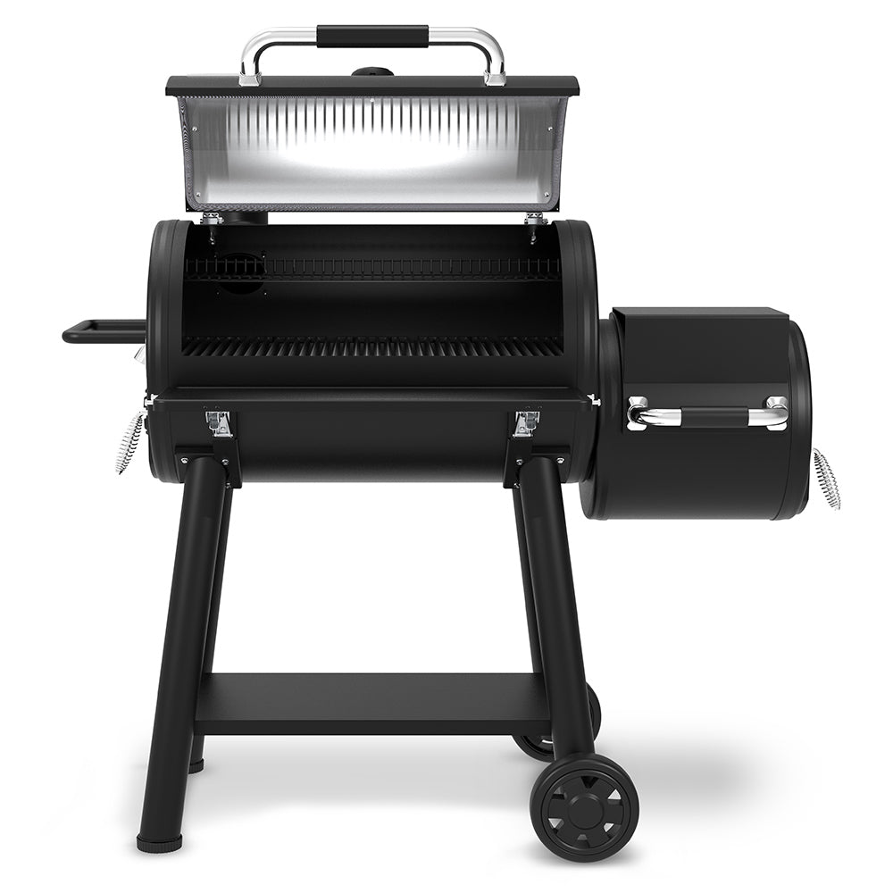 Offset charcoal smoker with lid open, main cooking chamber and side fire box visible
