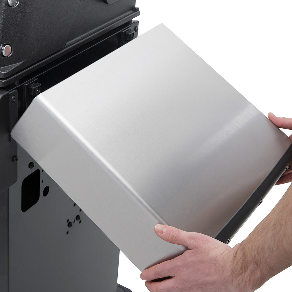 Folding stainless side tray being pulled open on a gas grill, right side view
