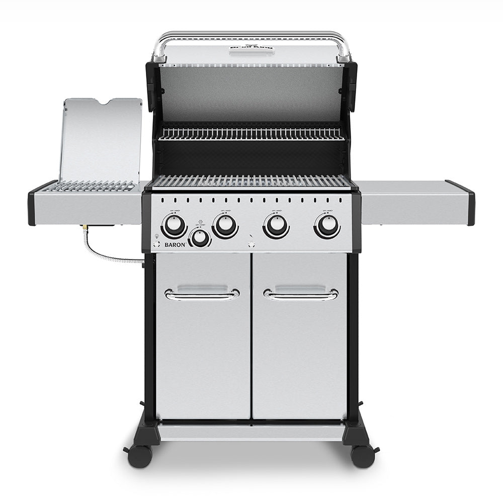 Stainless steel gas grill with open lid, burner grates, and front control knobs