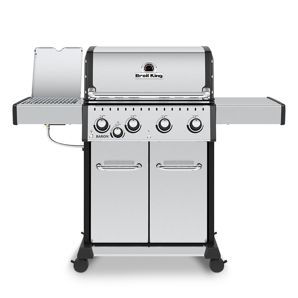Stainless steel 4-burner gas grill with side shelf and closed lid, front view