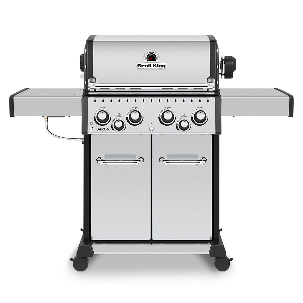 Stainless steel 4-burner gas grill with front control panel and side shelves