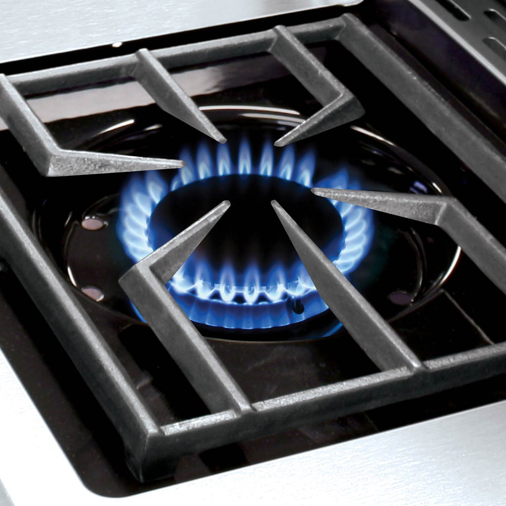 Gas grill burner with visible blue flames beneath metal grates