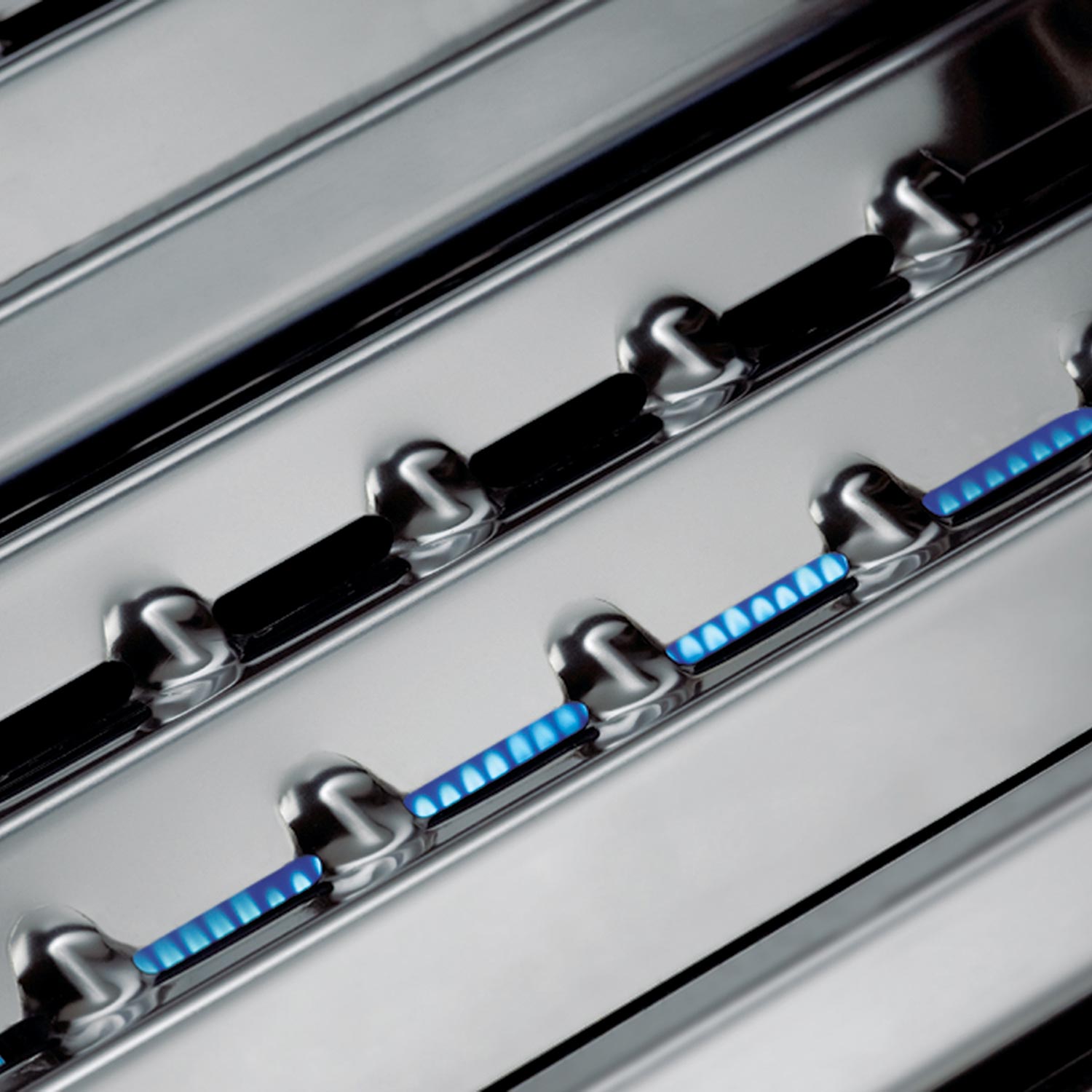 Grill burner flavorizer bars with blue-lit ignition indicator strips