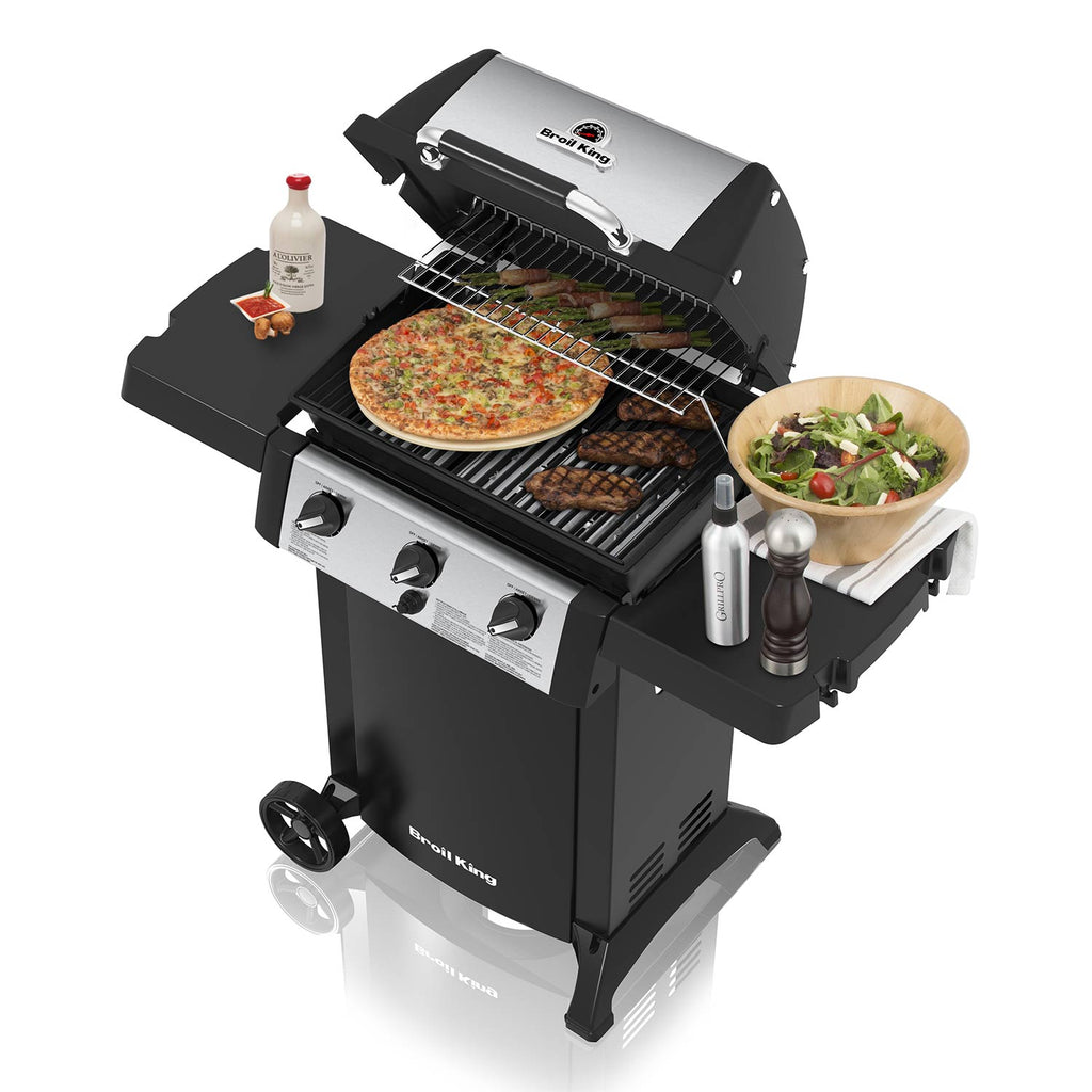 Broil King 3-burner propane grill with cooking grates and food on open lid