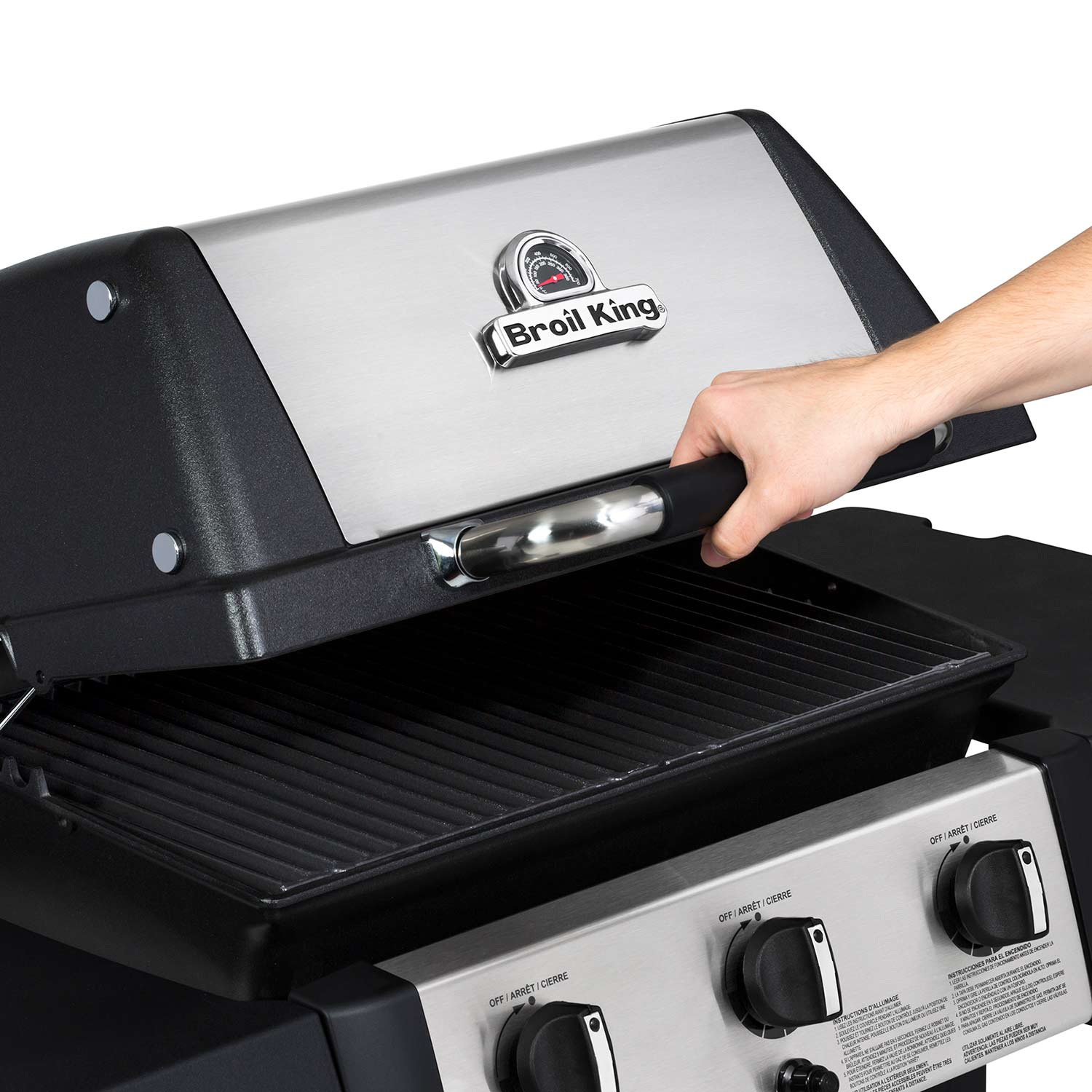 Broil King grill lid with front handle and control knobs, open cooking area