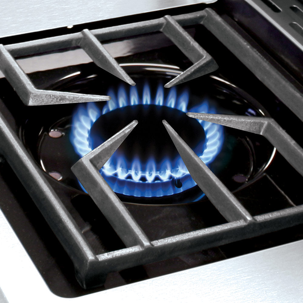 Gas grill burner with blue flame under black grate supports