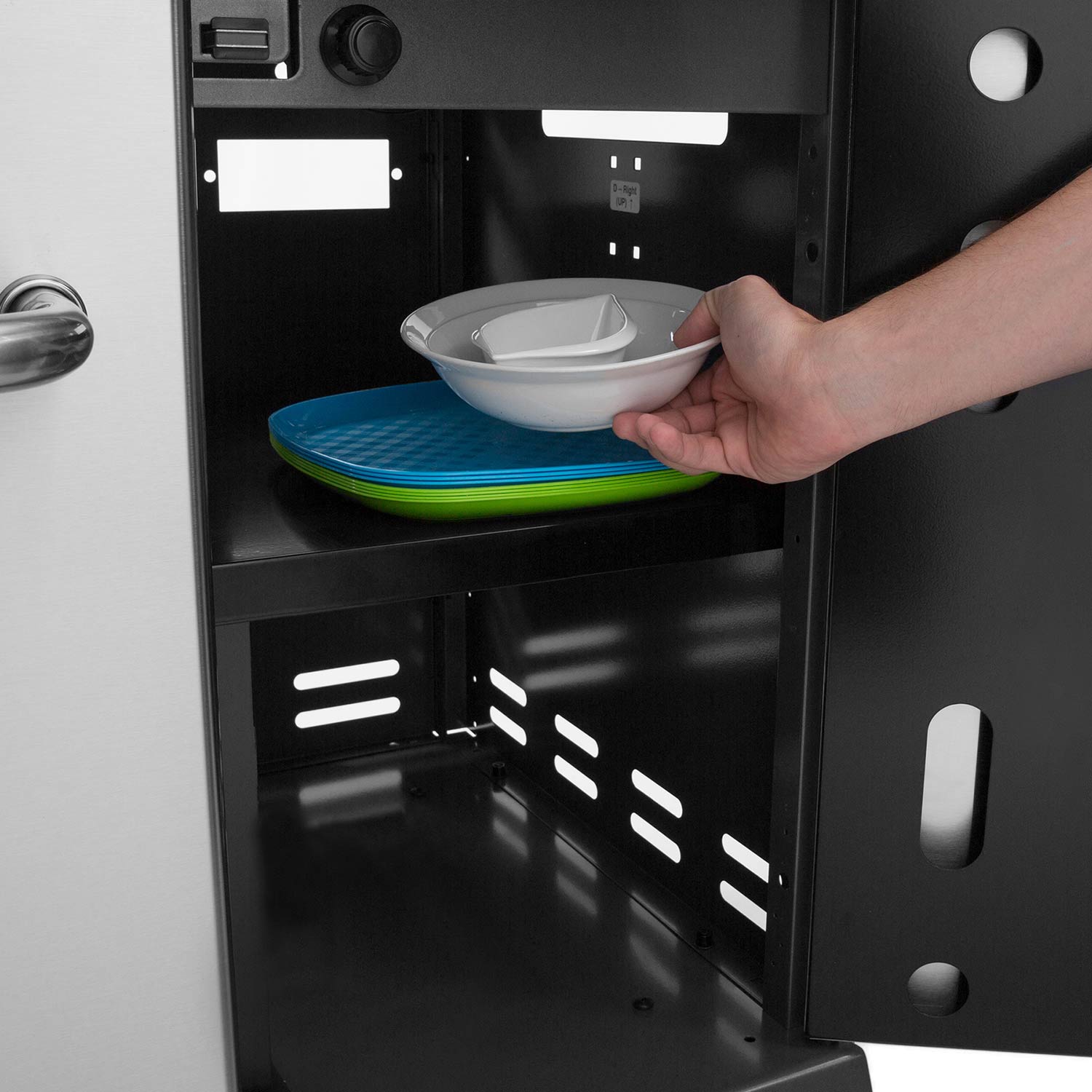 Gas grill warming drawer with interior shelves and holding bowl