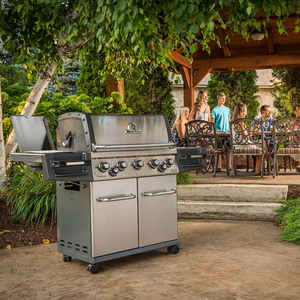 Stainless steel 5-burner gas grill on wheels with open hood and side control panels