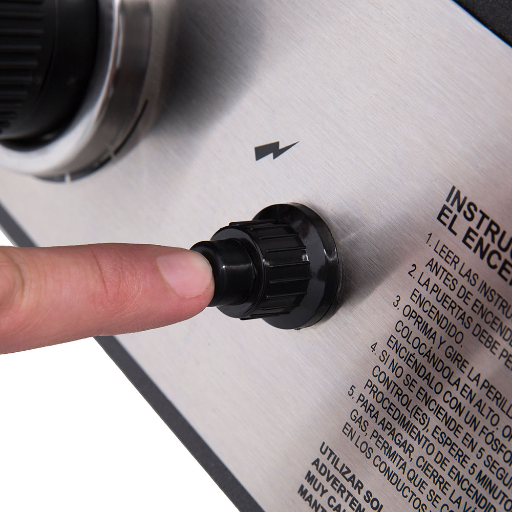 Gas smoker control knob on stainless control panel