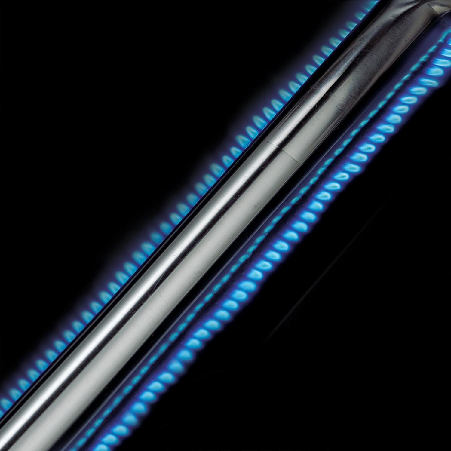 Radiant burner tubes with blue LED glow on Broil King 3-burner propane grill
