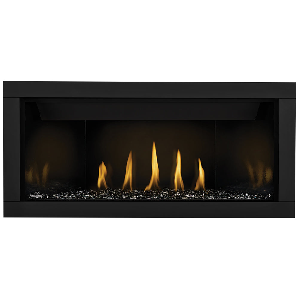 Direct vent gas fireplace with dark glass embers and yellow flames