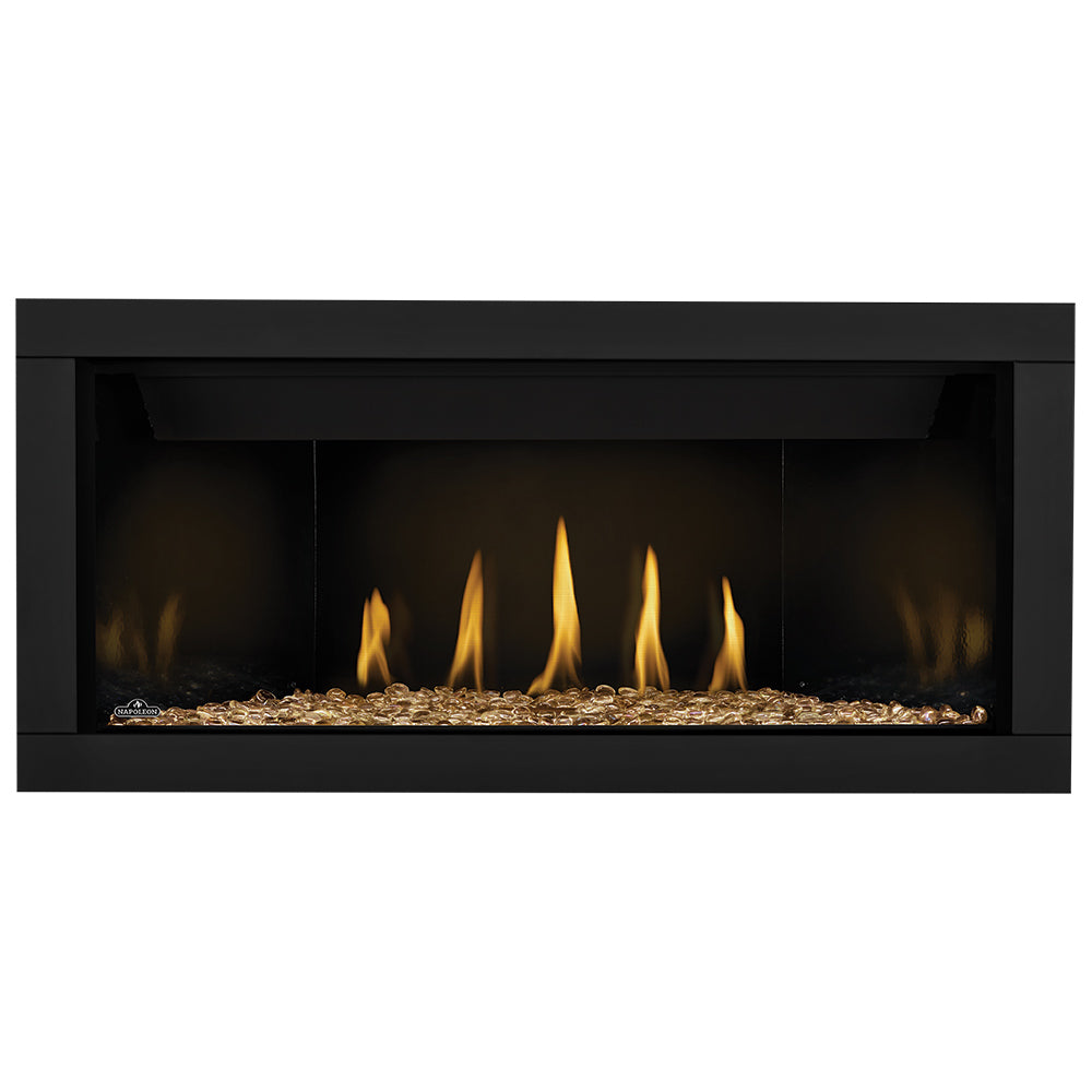 Direct vent gas fireplace with light tan embers and yellow flames