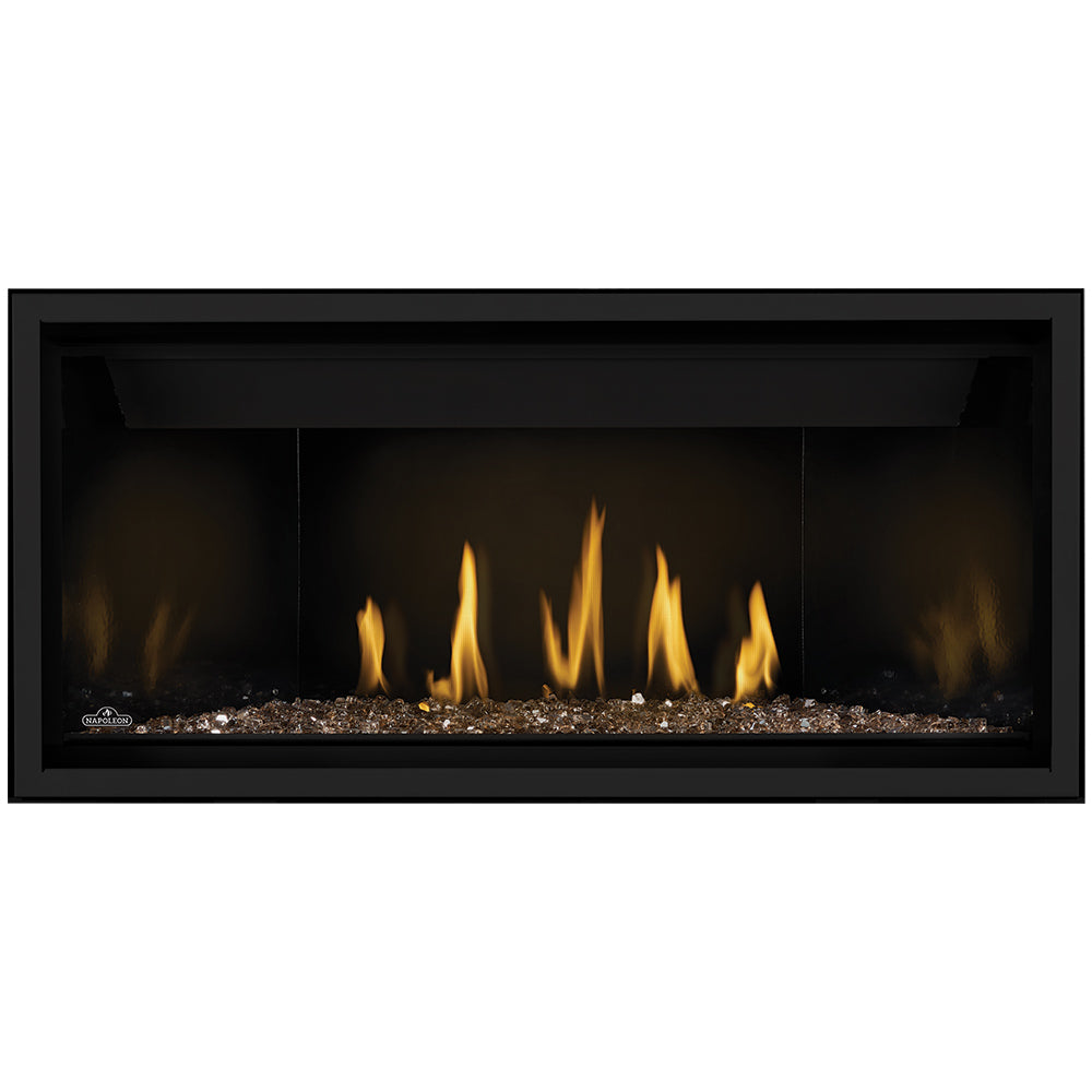 Direct vent gas fireplace with tan embers and yellow flames