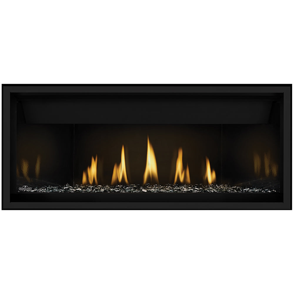 Direct vent gas fireplace with dark glass embers and black surround; flames visible