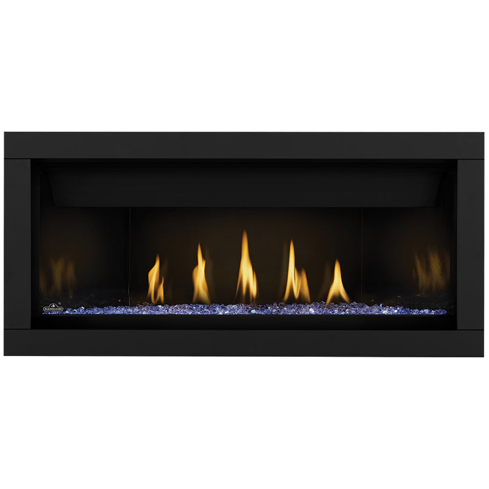 Direct vent gas fireplace with blue glass embers and black surround; flames visible