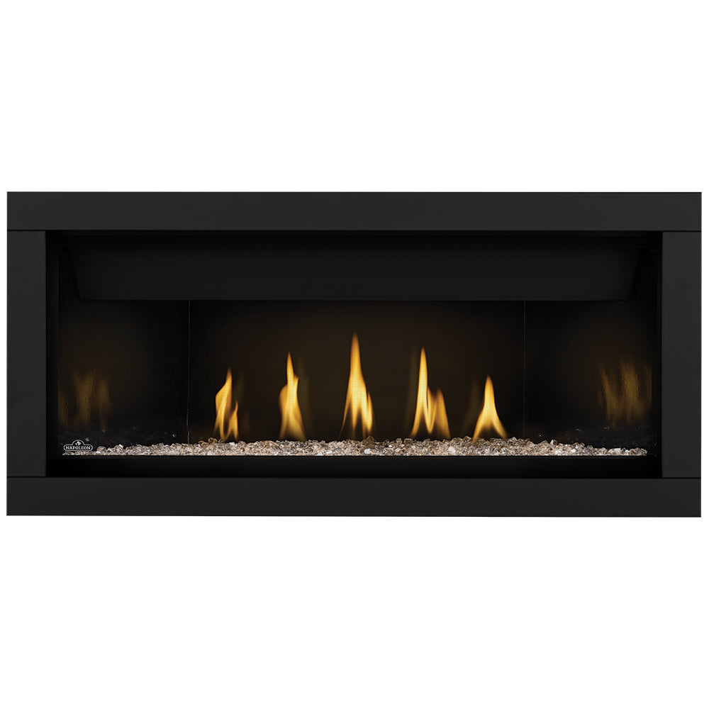 Direct vent gas fireplace with clear glass embers and black surround; flames visible