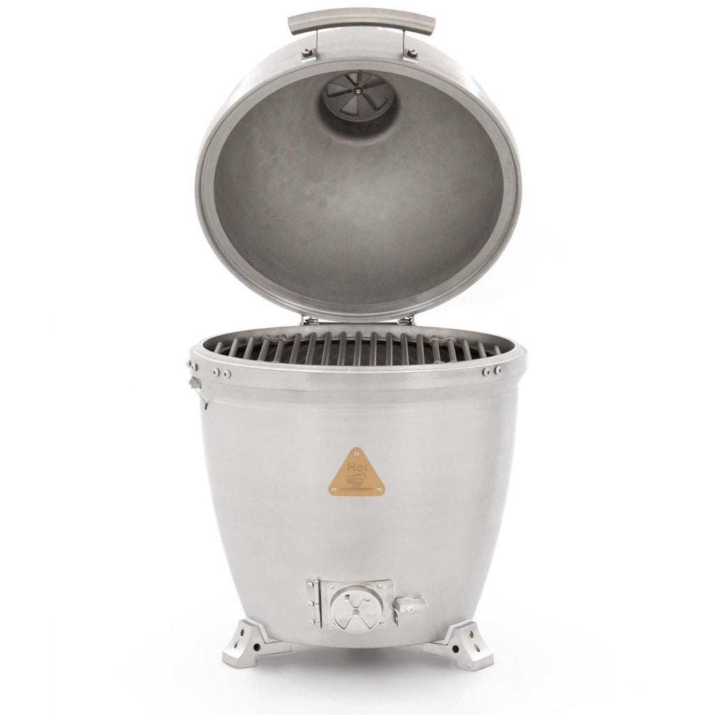 Cast aluminum kamado grill open with cooking grate and top vent knob