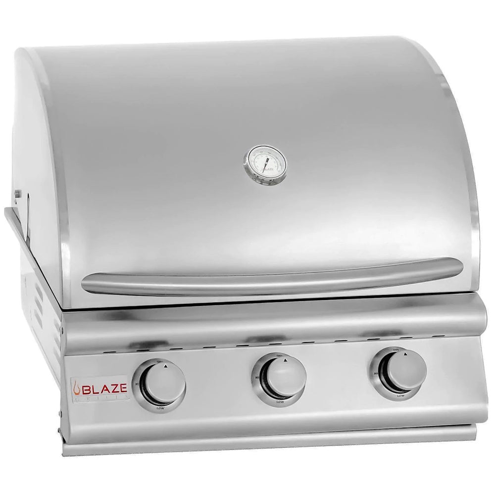 Stainless steel gas grill front with three control knobs and lid thermometer