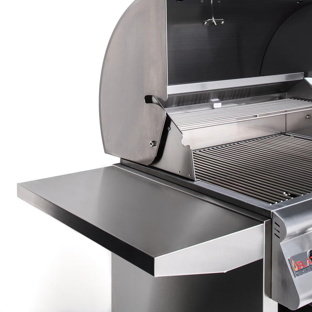 Freestanding gas grill with open lid showing grill grate and side control panel