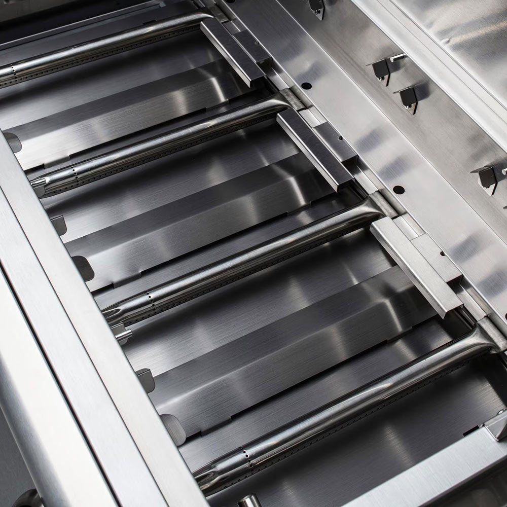Gas grill firebox with stainless interior grates and burner tubes