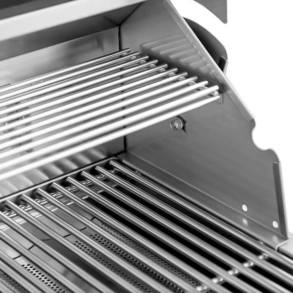 Stainless steel gas grill open with cooking grate rows and interior controls