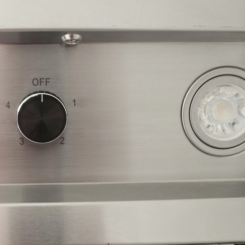 Outdoor vent hood control dial and circular light lens on brushed metal panel
